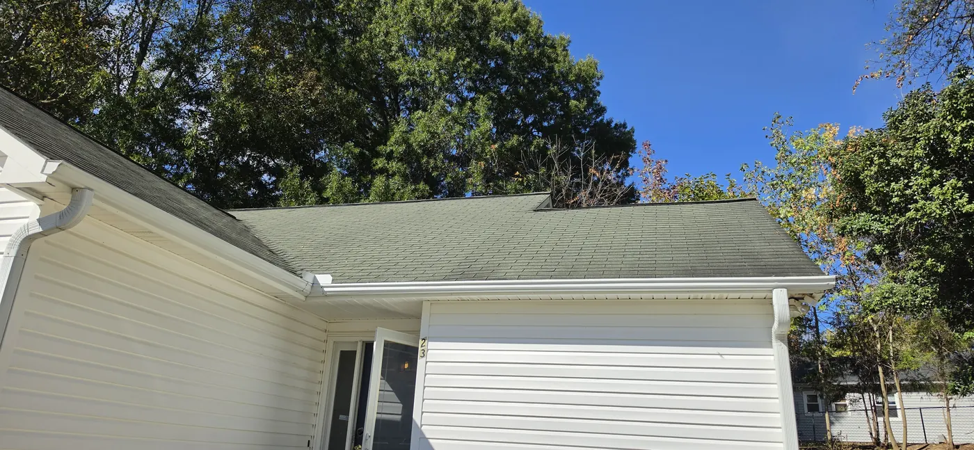Side view of a home and its asphalt shingle roof on a Roof Armor job